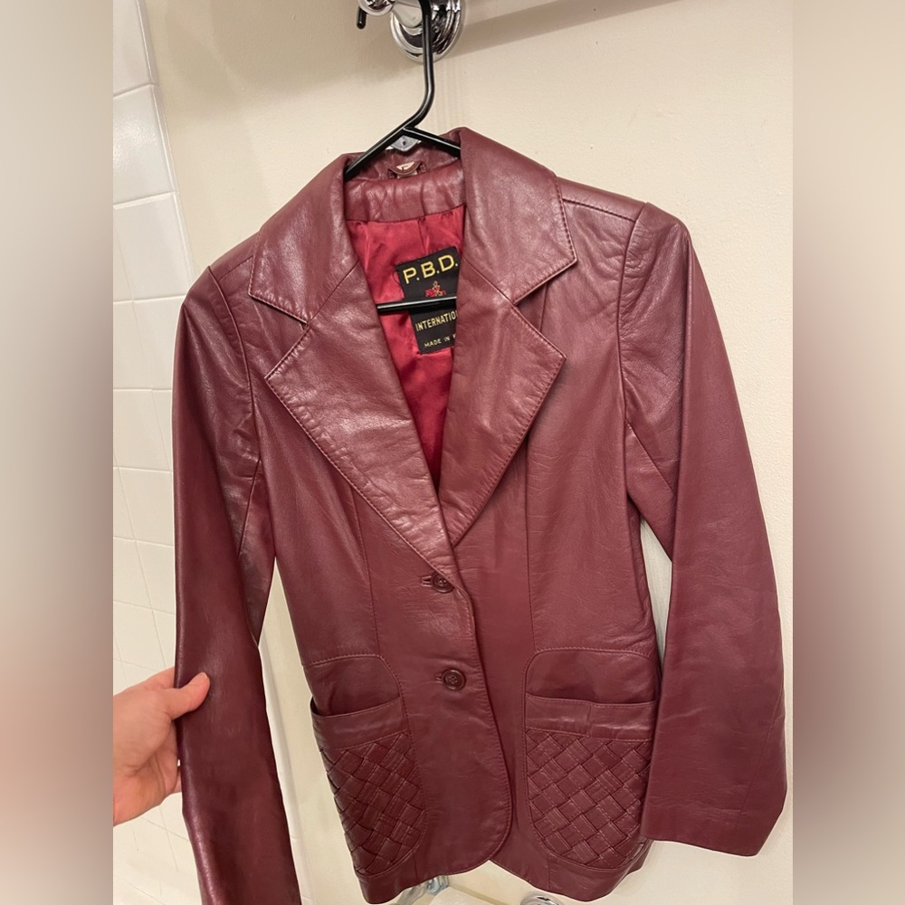 Deep wine red colored vintage leather jacket